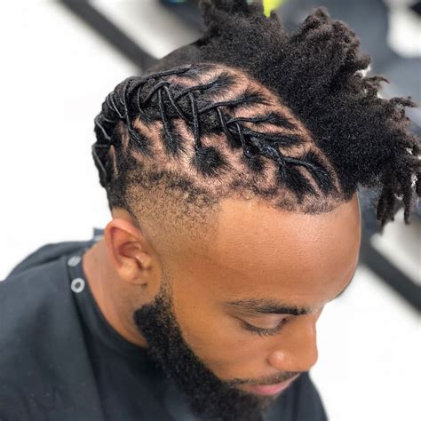 Here you have a different take on styling dreads, as these medium locks have been slightly curled to add extra texture. . Men loc hairstyles